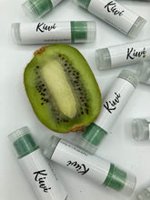 Load image into Gallery viewer, A collection of green kiwi flavoured lip balms with a real sliced kiwi